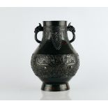 A Chinese bronze two-handled archaistic vase, Hu