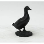 A bronze model of a duck