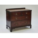 A mahogany chest with two short and two long drawers