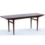 Heals; a mid 20th century teak dining table