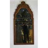 A Regence style gilt framed arch top mirror