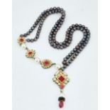 A two row necklace of dark grey tinted freshwater cultured pearls