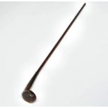 A mahogany Sunday golf club walking stick