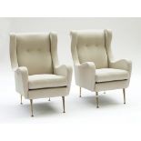 A pair of Retro Design wingback easy armchairs