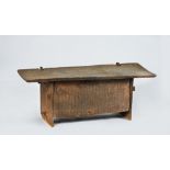 A plank wood adzed coffer possibly African the top 160cm wide