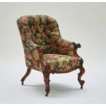 A Victorian rosewood framed tub back easy armchair