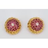 A pair of gold, ruby and diamond earclips