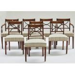 A set of eight George IV mahogany dining chairs