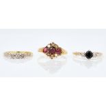 A gold, sapphire and diamond three stone ring and two further rings (3)