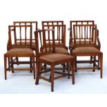A set of eight George III fruitwood framed square stick back armchairs