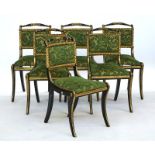 A set of six Regency parcel gilt ebonised dining chairs