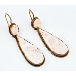 A pair of gold mounted pink shell pendant earrings (2)