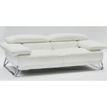 Roche-Bobois; A cream leather and chrome two seat sofa