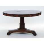 A Regency rosewood circular snap top centre table