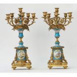 A pair of French gilt-bronze Sevres style six light candelabra