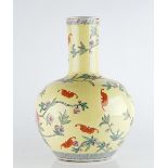 A large Chinese yellow-ground famille-rose bottle vase