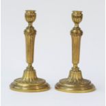 A pair of gilt-bronze candlesticks