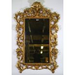 A large Baroque Revival gilt framed mirror