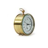 A brass cased clock barometer