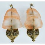 A pair of brass and etched glass nautical wall lights