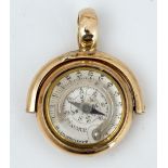 A gold mounted compass/thermometer fob seal