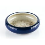 A Chinese stoneware shallow bowl