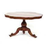 A rosewood centre table