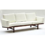 A 20th century design teak framed sofa