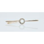 A gold and diamond set bar brooch