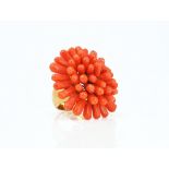 A coral brooch converted to a ring