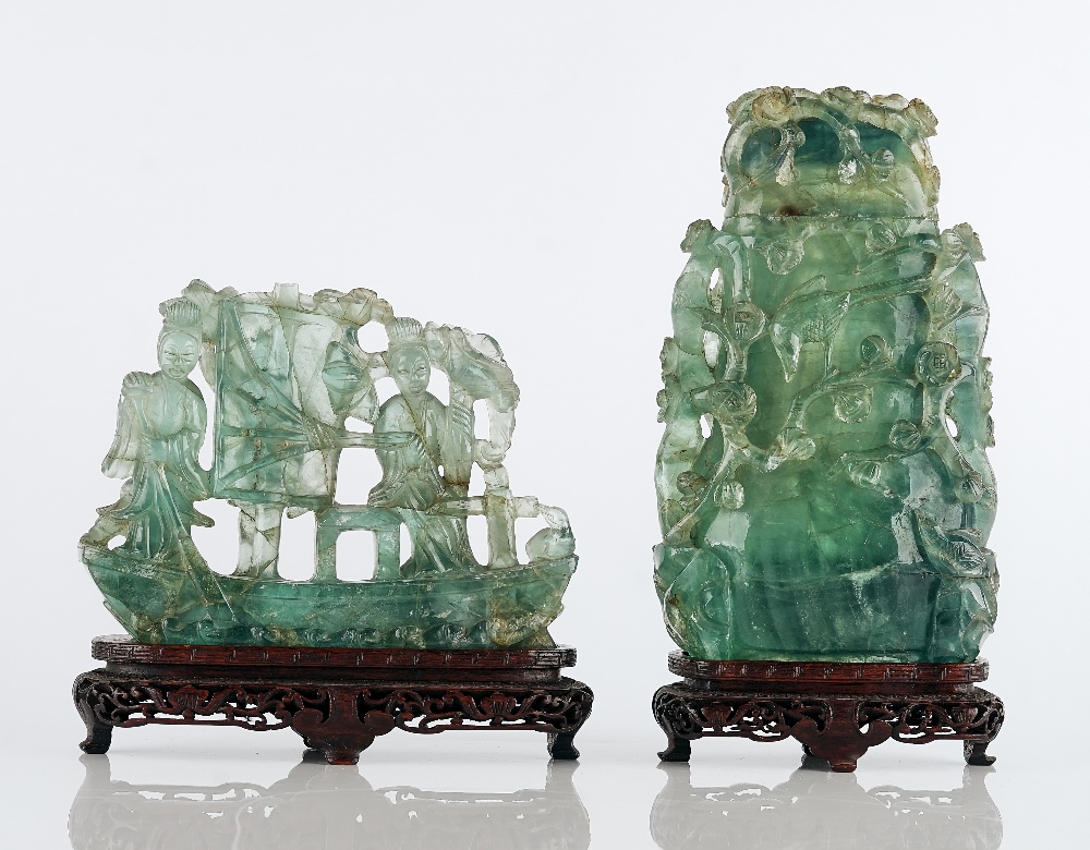 A Chinese green fluorite vase and cover and a figural group