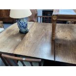 A George III mahogany D-end extending dining table