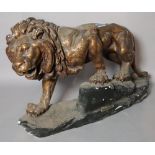 A modern plaster figure of a lion