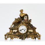 A FRENCH GILT-METAL AND MARBLE MOUNTED STRIKING MANTEL CLOCK