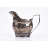 A George III silver milk jug