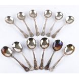 Six silver King's pattern soup spoons and six King's pattern plated spoons (12)