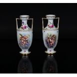 A pair of small Berlin porcelain two-handled vases