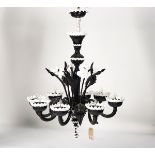 AN OPAQUE BLACK AND WHITE GLASS EIGHT-LIGHT CHANDELIER