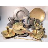 Metal ware including a quantity of late 19th century pewter wares and a pair of brass chamber...