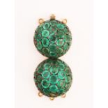 AN EMERALD CLASP