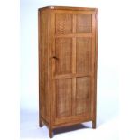 HEAL’S; A LIMED OAK SINGLE WARDROBE