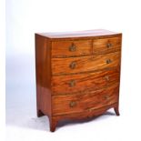 A REGENCY ROSEWOOD BANDED MAHOGANY BOWFRONT CHEST