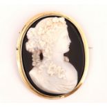 A MOULDED PASTE CAMEO OVAL BROOCH