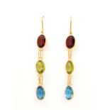 A PAIR OF GOLD AND GEMSTONE THREE STONE PENDANT EARRINGS