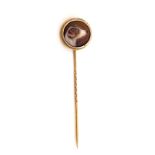 A VICTORIAN GOLD MOUNTED ENAMELLED STICKPIN