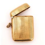 A 9CT GOLD CURVED RECTANGULAR VESTA CASE