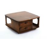 ERCOL; A PANDORA'S BOX ELM COFFEE TABLE