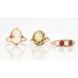 AN 18CT GOLD MOONSTONE AND RED GEM SET RING AND TWO FURTHER RINGS (3)