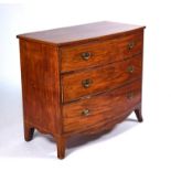 A REGENCY BOWFRONT MAHOGANY CHEST