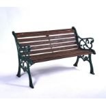 AN EARLY 20TH CENTURY GREEN PAINTED CAST IRON GARDEN BENCH